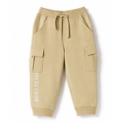 Babyhug Cotton Terry Knit Full Length Solid Lounge Pant with Cargo Pockets & Best Team Text Print - Cream