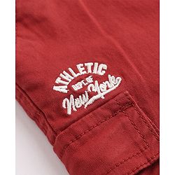 Babyhug Twill Woven Comfort Fit Above Knee Length Bermuda with Athletic Dept. of New York Embroidery in Maroon