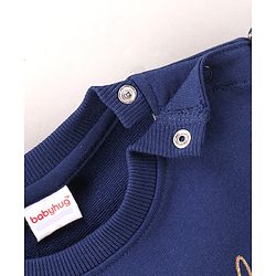 Babyhug Full Sleeves Sweatshirt With frill and Deer Print Along With Sequence - Blue