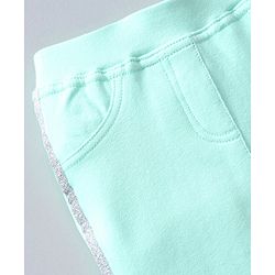 Babyhug Full Length Cotton Lycra Jeggings Solid WIth Lurex Side Tape- Green
