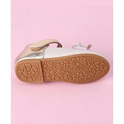 Cute Walk by Babyhug Velcro Closure Shimmer Striped Bellies with Bow Applique - Pink