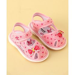 Cute Walk by Babyhug Velcro Closure Musical Sandals with Heart Print & Bow - Pink