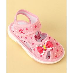 Cute Walk by Babyhug Velcro Closure Musical Sandals with Heart Print & Bow - Pink