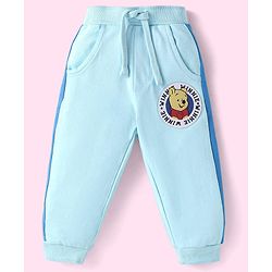 Babyhug Disney Terry Knit Full Raglan Sleeves T-Shirt & Cut & Sew Lounge Pant with Winnie the Pooh Graphics - Light Blue