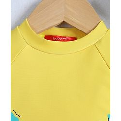 Babyhug Half Raglan Sleeves Two Piece Swimsuit With Dino Print & Cap - Yellow
