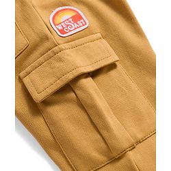 Babyhug French Terry Knit Full Length Lounge Pant With Badge Detailing & Cargo Pockets - Cream