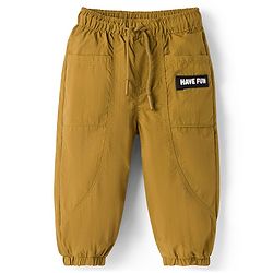 Babyhug Woven Full Length Solid Trouser With Stretch - Dark Yellow
