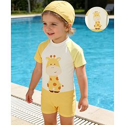 Babyhug Raglan Half Sleeves Giraffe Printed Legged Swimsuit With Cap - Light Yellow & White