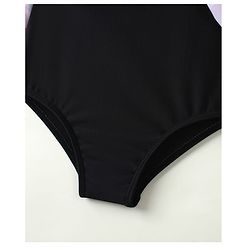 Babyhug Sleeveless Polka Dot Printed V Cut Swimsuit With Bow Applique & Cap - Black