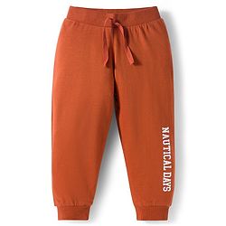 Babyhug Cotton Knit Full Length Lounge Pants With Text & Dino Print Pack of 3 - Orange Brown & Green