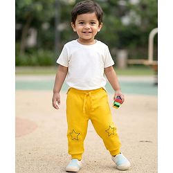 Babyhug Terry Knit Full Length Lounge Pant With Star Print - Yellow