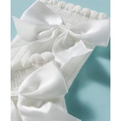 Cute Walk by Babyhug Non Terry Knit Calf Length Solid Party Socks with Bow Applique & Cable Knit Design - Pink