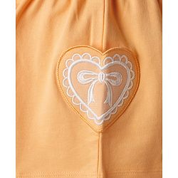Babyhug Terry Knit Mid Thigh Shorts With Heart Embroidery & Bow Applique - Peach