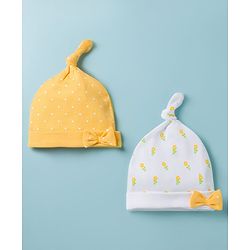 Babyhug 100% Cotton Interlock Knit Polka Dots & Floral Printed Caps With Bow Applique Pack Of 2 Multicolor - Diameter 16.5 cm