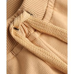 Babyhug Cotton Terry Knit Track Pant with Explore Text & Cargo Pocket in Cream