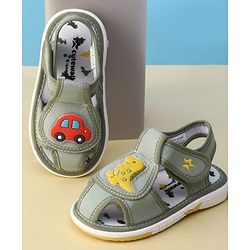 Cute Walk by Babyhug Velcro Closure Printed Musical Sandal With Vehicles & Dino Applique - Olive Green