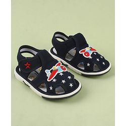Cute Walk by Babyhug Velcro Closure Musical Sandal With Star  Print & Aeroplane Applique - Blue