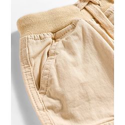 Babyhug Twill Woven Full Length Trousers with Text Patch & Cargo Pockets - Beige