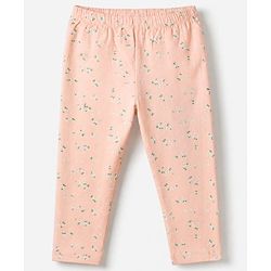 Babyhug Cotton Lycra Elastane Knit Slim Fit Full Length Solid Leggings with Floral & Polka Dots Print Pack of 3 - Peach, Baby Pink & Light Green