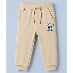 Babyhug Cotton Terry Knit Jogger Fit Full Length Lounge Pant with Varsity Team Text Print - Beige