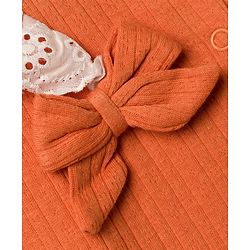 Babyhug Cotton Knit Full Sleeves Footed Sleepsuit with Bow & Peter Pan Collar - Coral