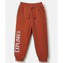 Babyhug Cotton Looper Knit Full Length Jogger Fit Lounge Pant with Lets Explore Print in Rust Orange