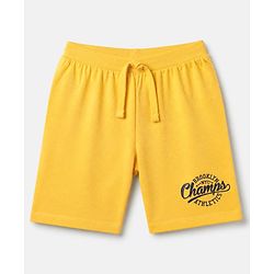 Babyhug 100% Cotton Knit Mid Thigh Shorts with Brooklyn Nyc Champs Athletics Print in Yellow for 5-6 Years